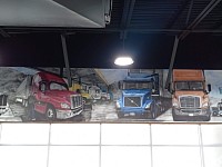 paintings in gas station store